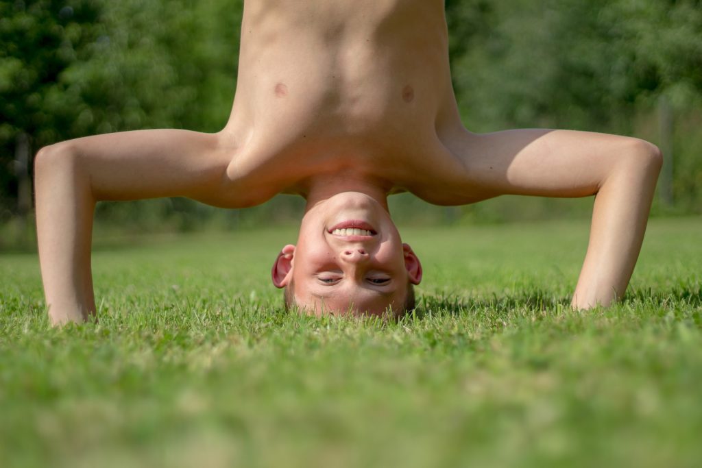 headstand 1024x683 - How to ensure your kids stay healthy through exercise